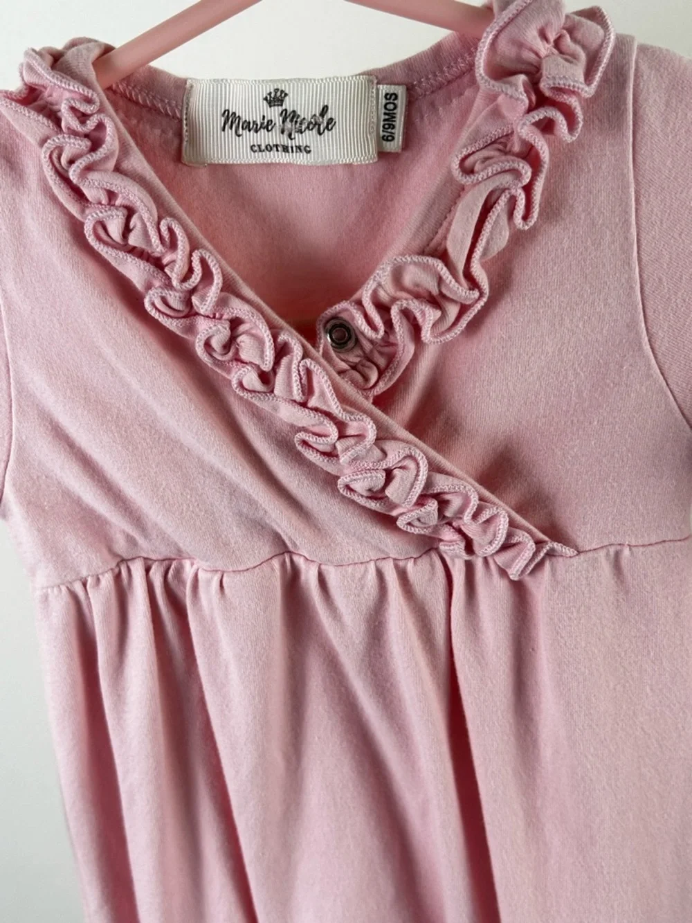 Marie Nicole Clothing Baby Pink Ruffle-Trim Footed One-Piece